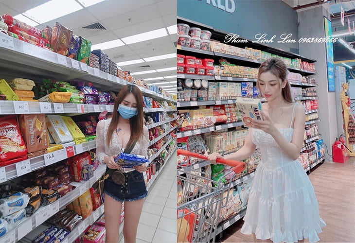 Tạo dáng chụp ảnh sống ảo đang tìm đồ trong siêu thị